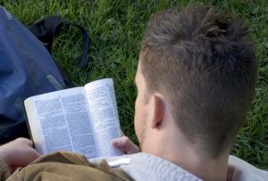 guy reading Bible
